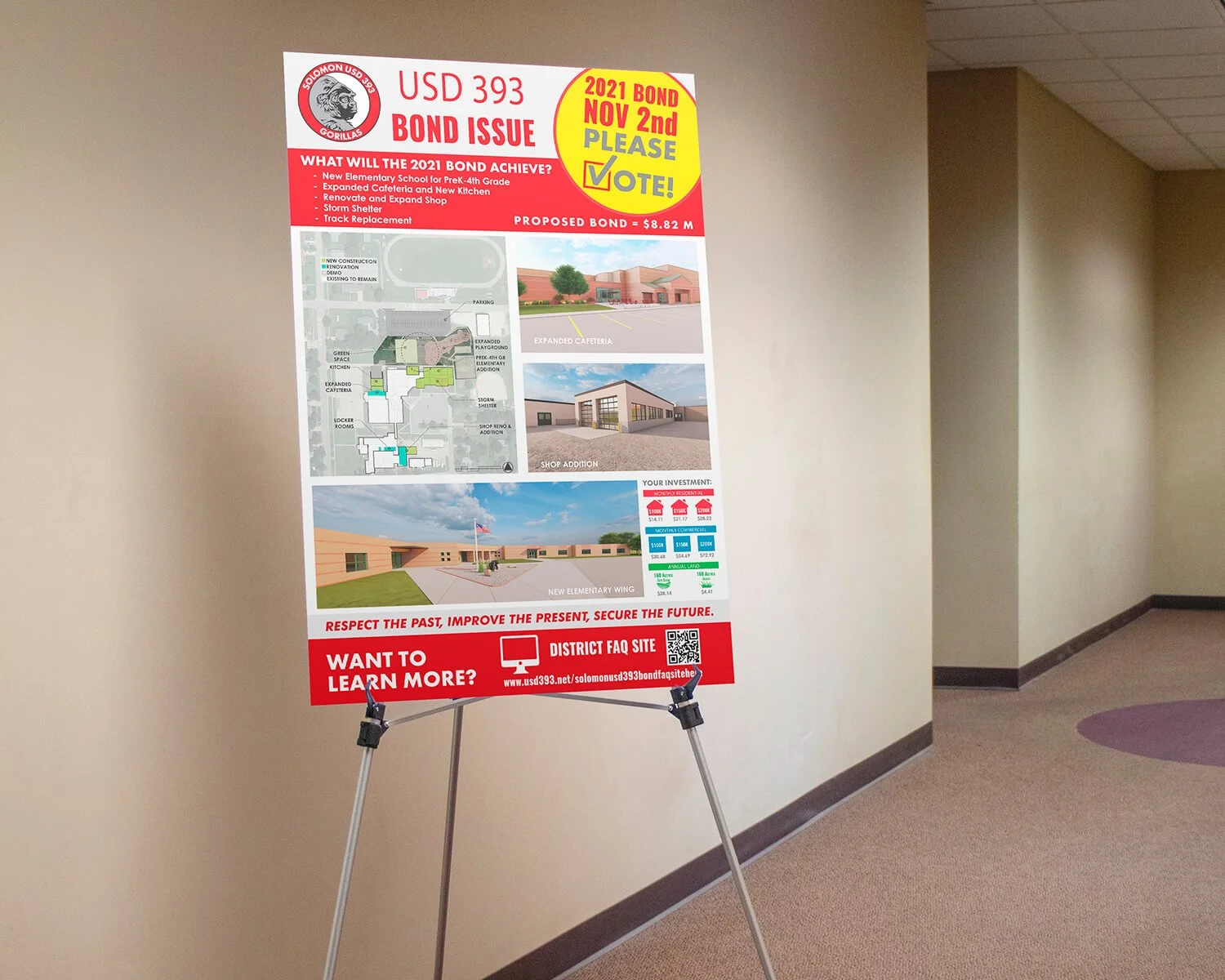 A colorful informational poster about the USD 393 Bond Issue on display on a stand in a hallway.