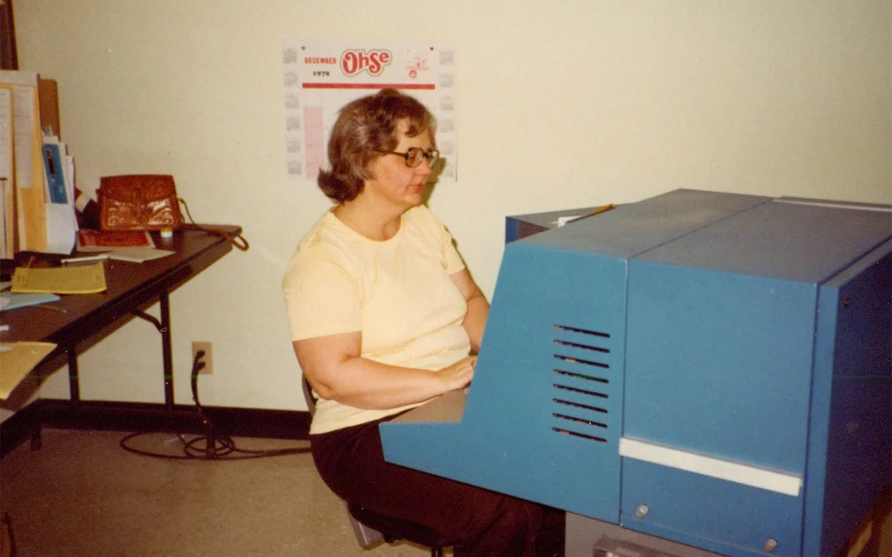 Mainline-Printing-Signs-Holographics-Packaging-Fulfillment-WomanAtComputer2.jpg