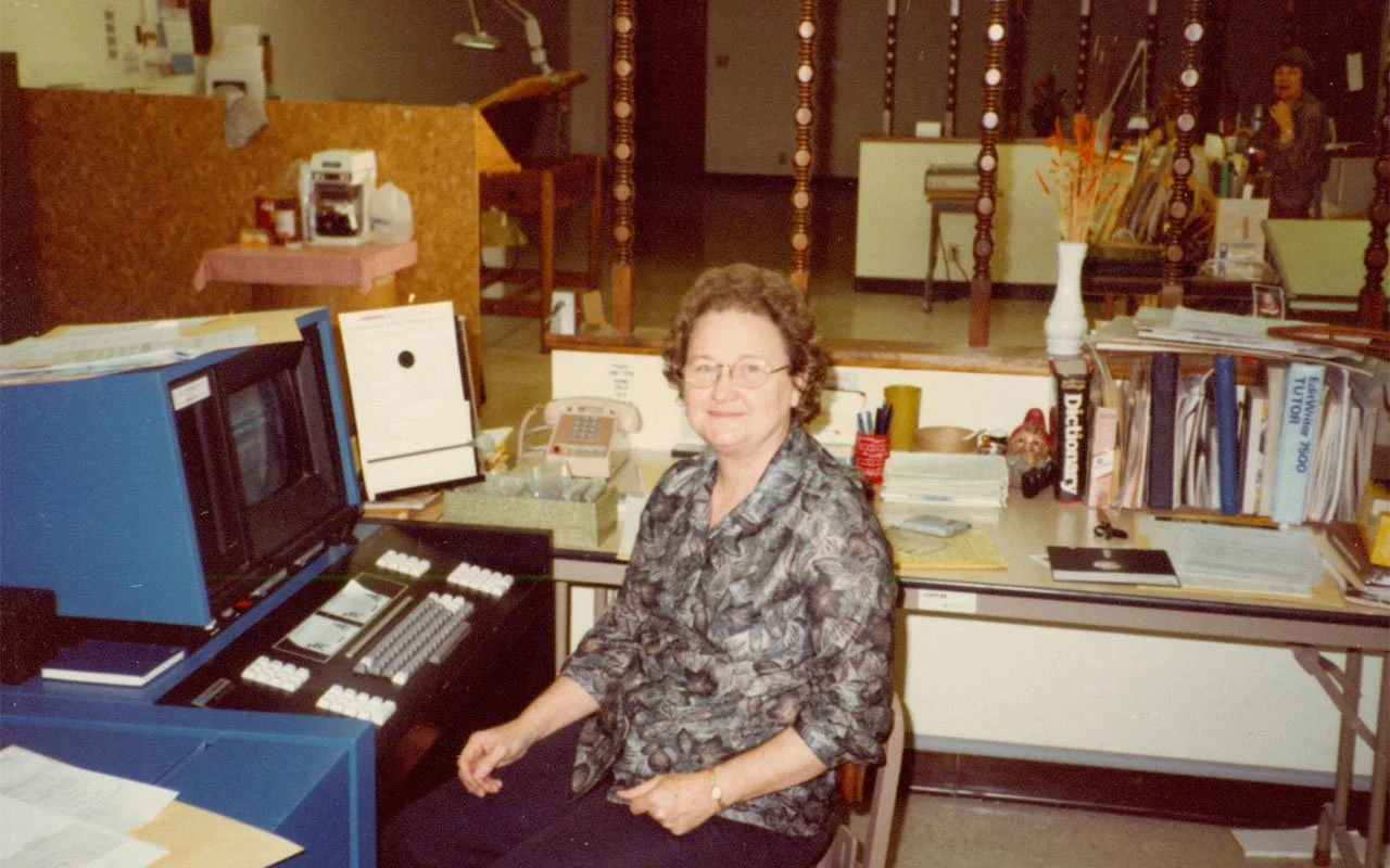 Mainline-Printing-Signs-Holographics-Packaging-Fulfillment-WomanAtComputer.jpg