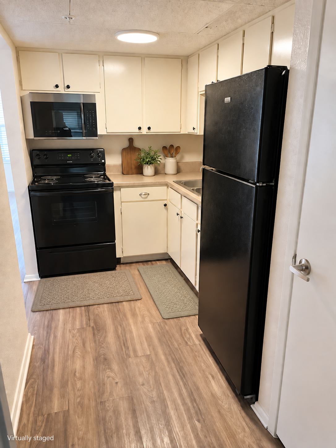 Oakcrest kitchen with coordinated neutral mats.png