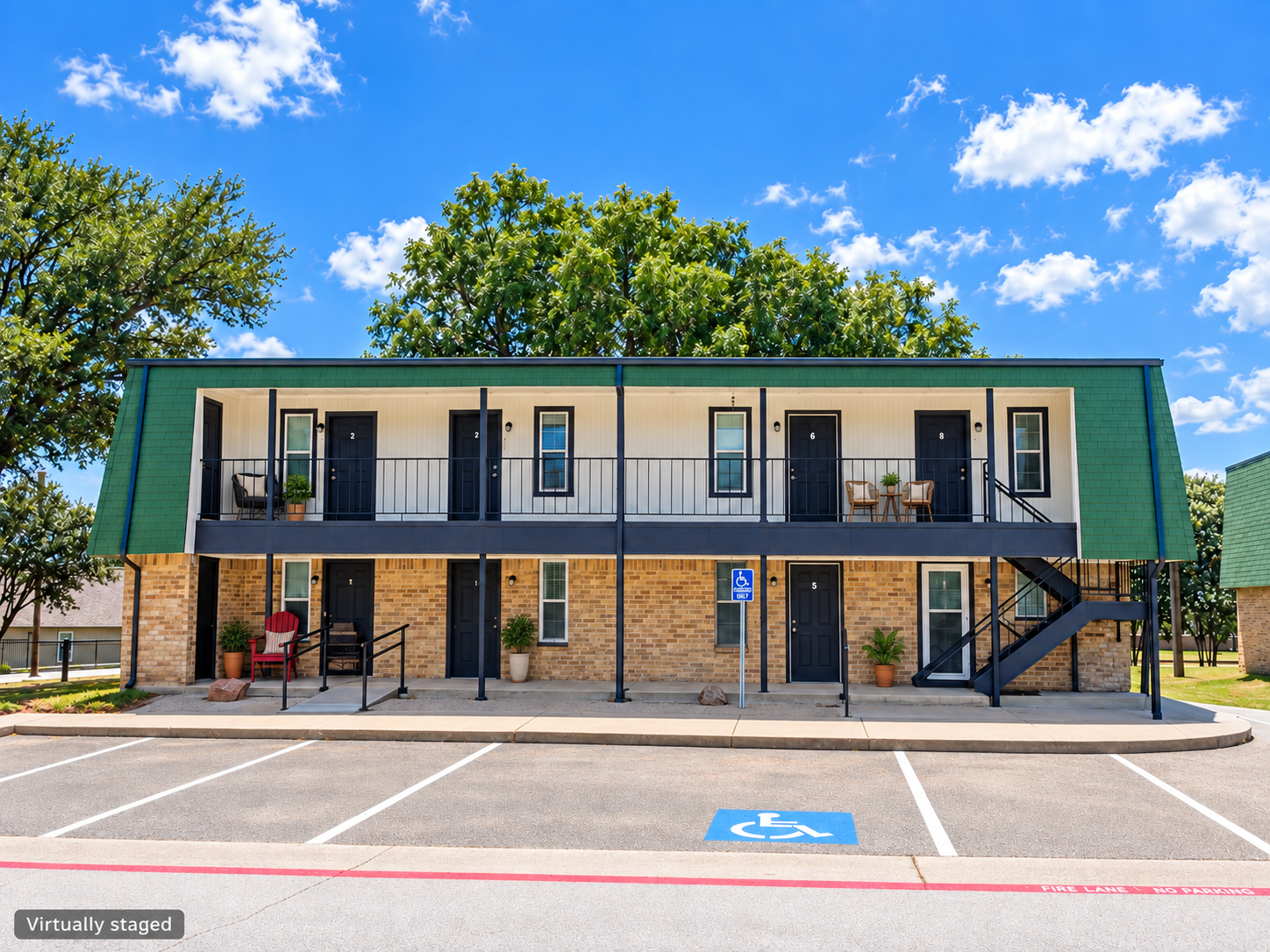 Oakcrest exterior with refreshed parking and patio.png
