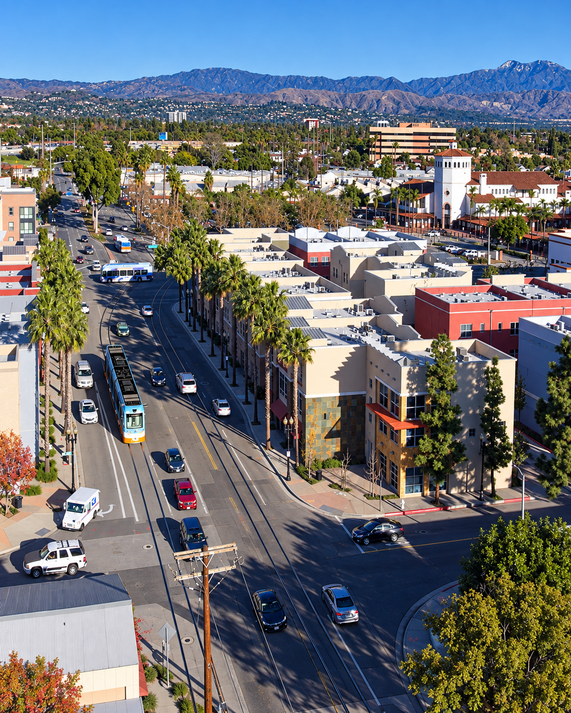 A city shot of OC light rail in traffic 