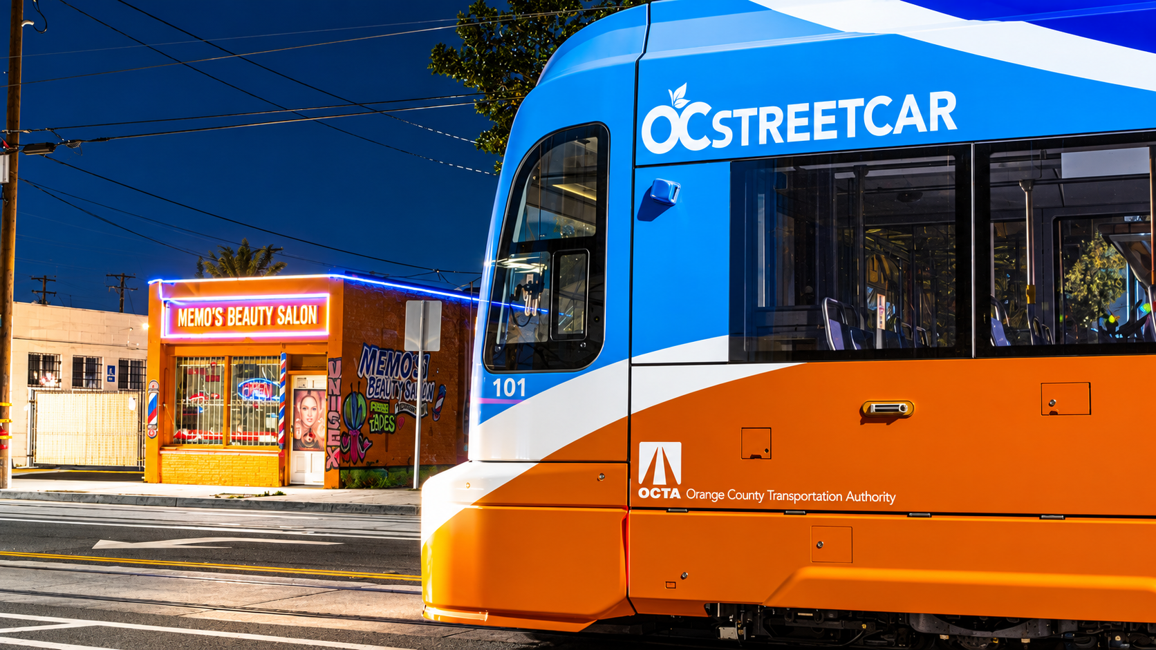 An image of OC streetcar at night