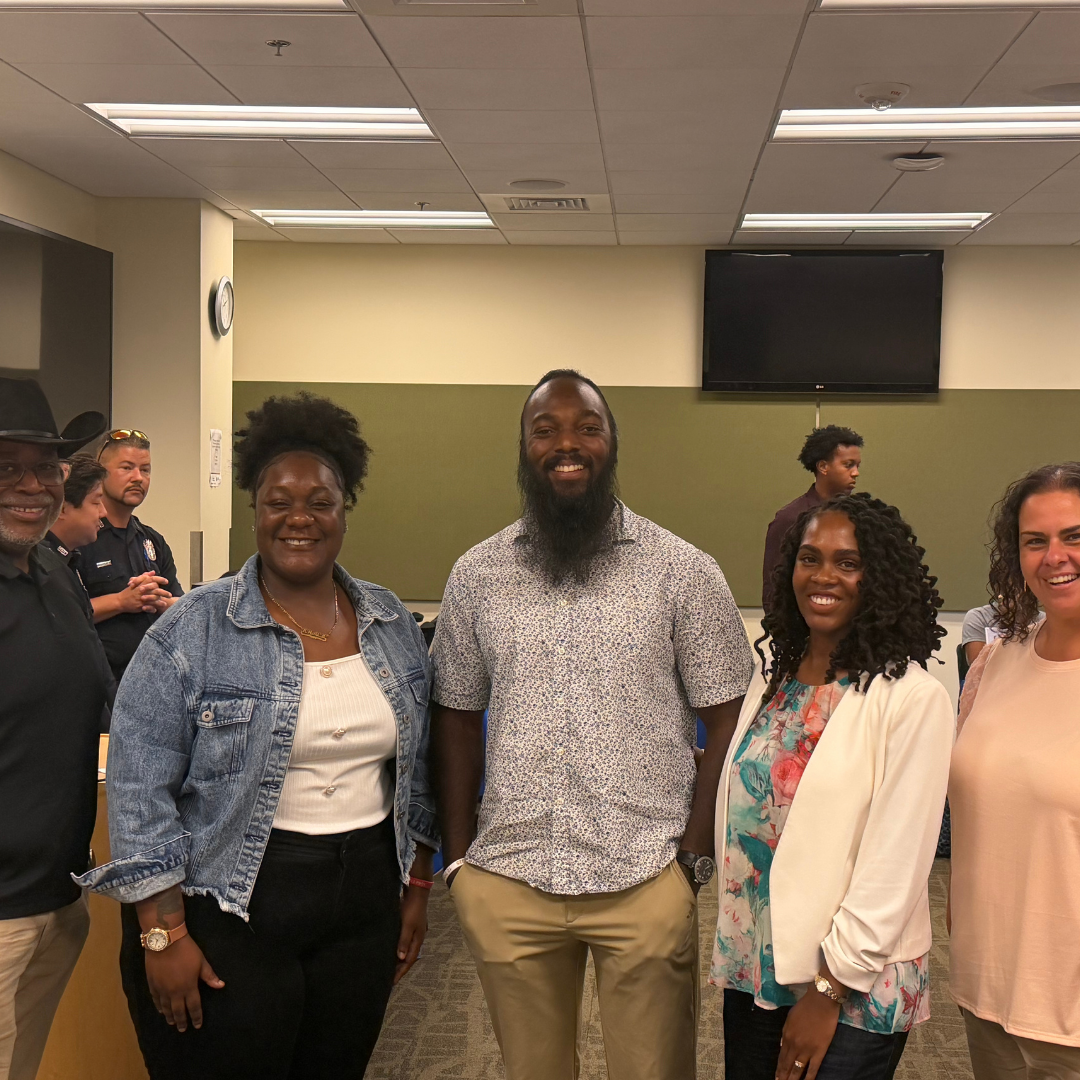 Jonathan and Camarie, founders of CFFYD are standing with fellow civic leaders and panelists at CFFYD's career resource fair. 