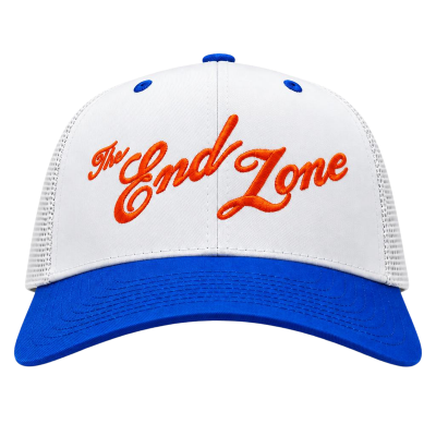 White baseball cap with a blue bill and blue ventilation eyelets, with orange embroidered text that reads 'The End Zone'.