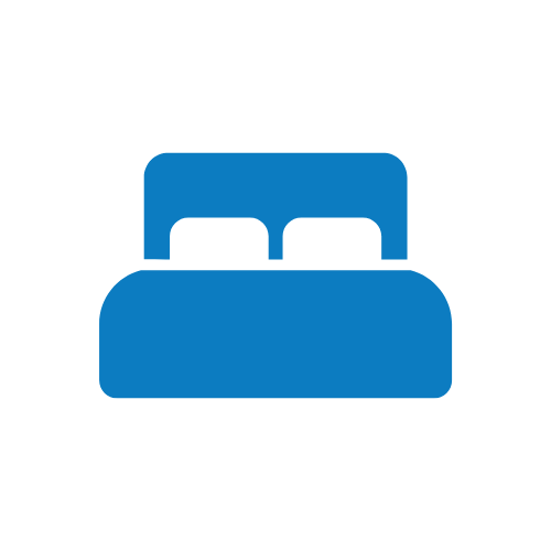 Icon of a bed with two pillows, representing a bedroom or sleeping area.