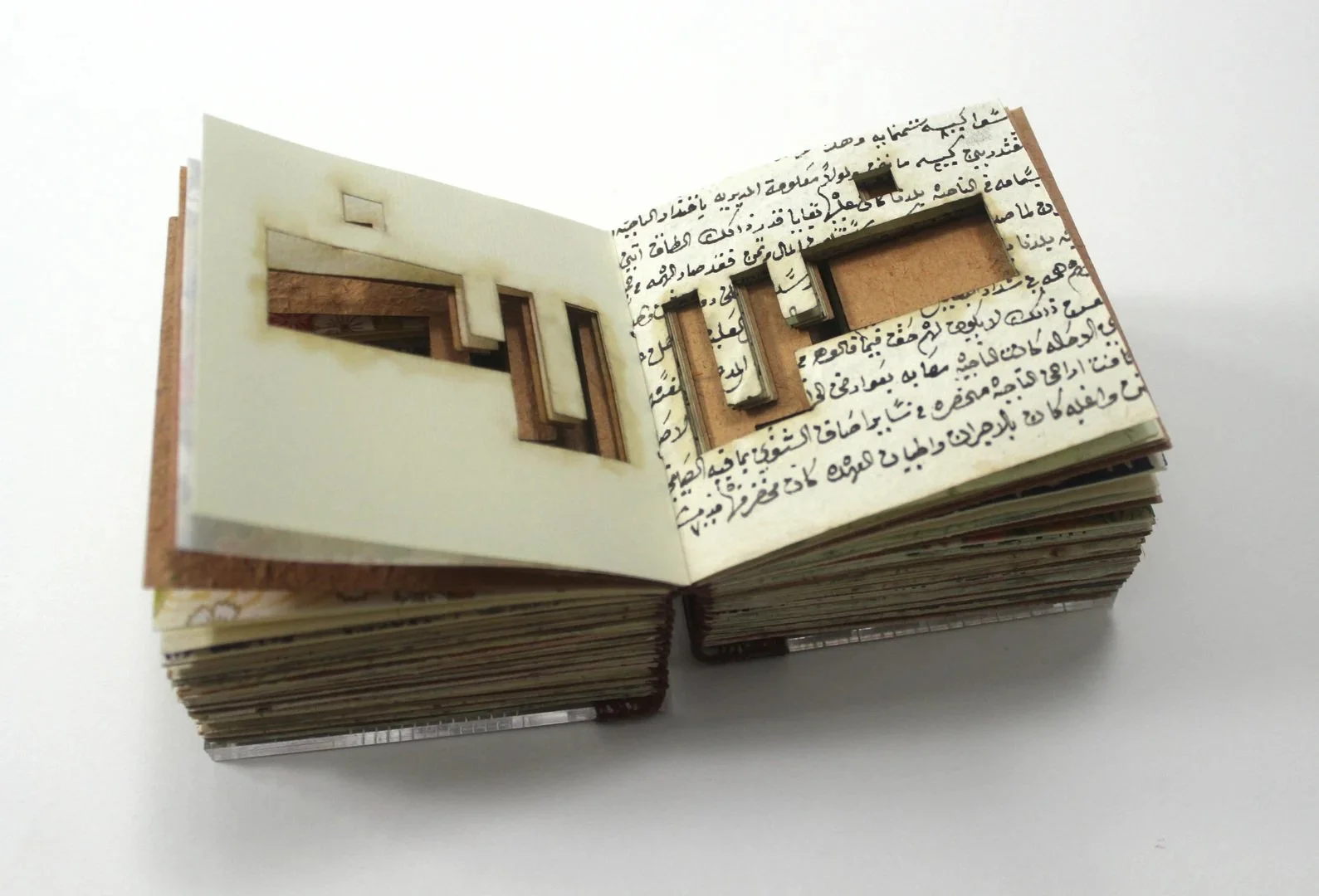 Harf: geometric Arabic letterforms in handmade and handwritten papers, 2025