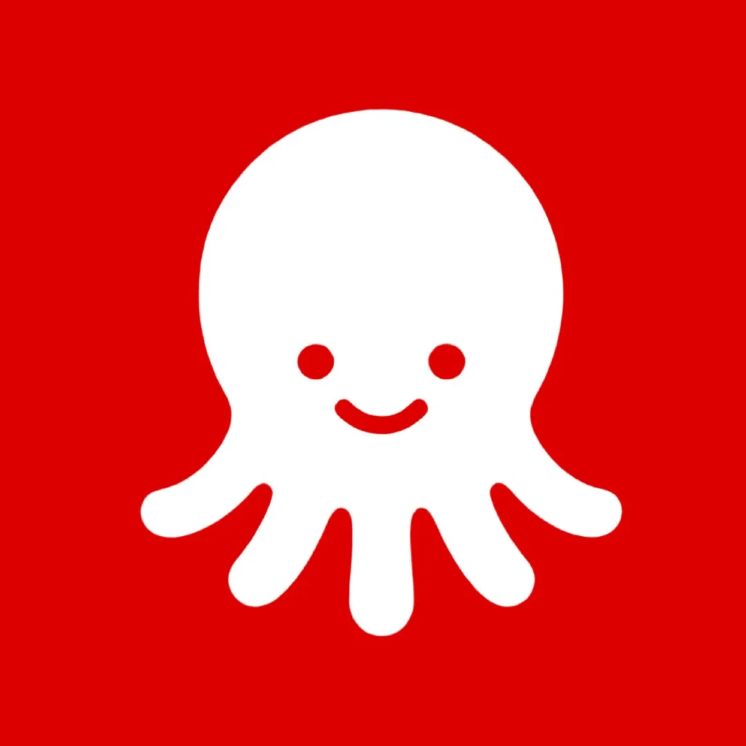 A cartoon white octopus with a smiling face on a red background.
