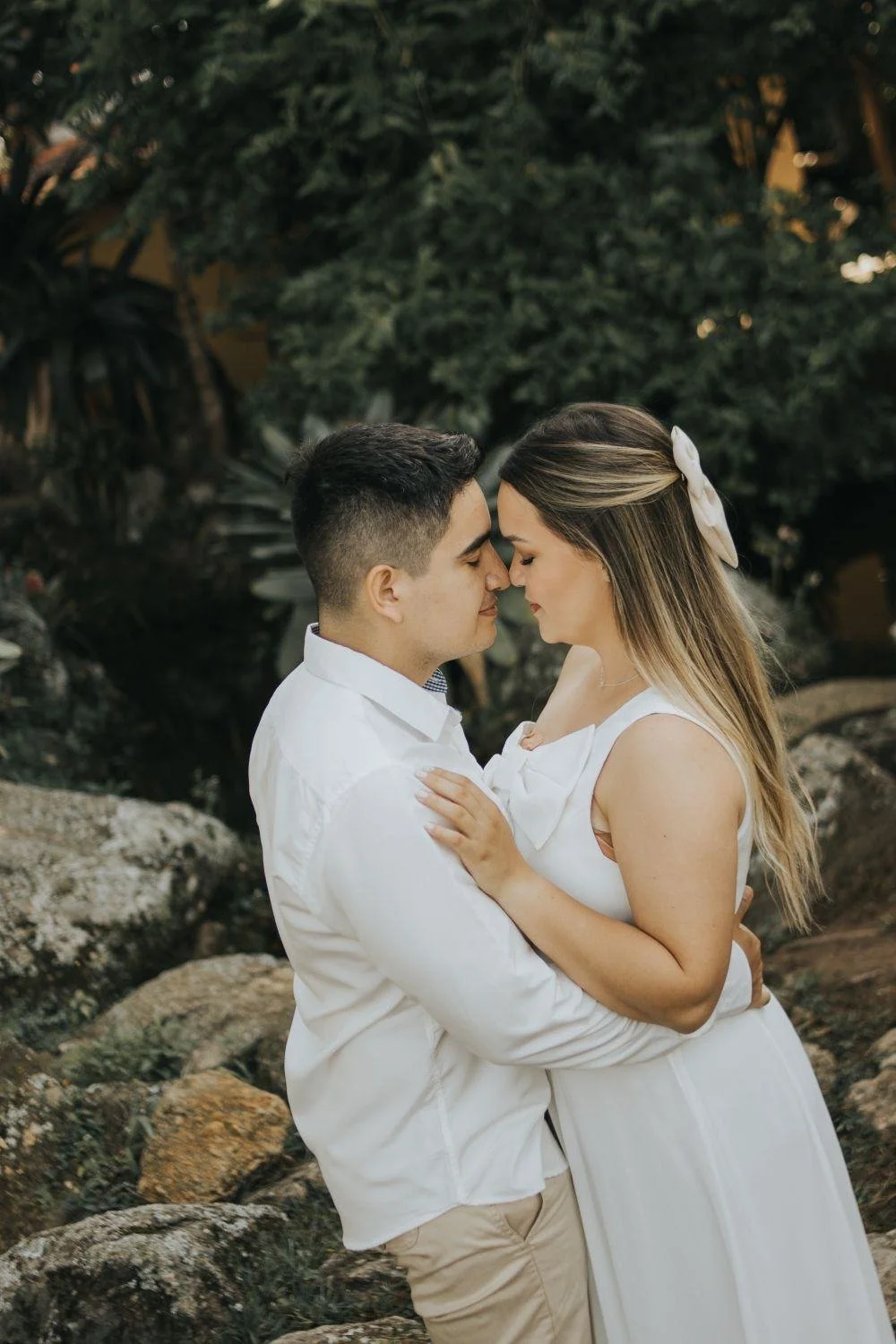 Love in Action coaching: a couple holding each other close outdoors