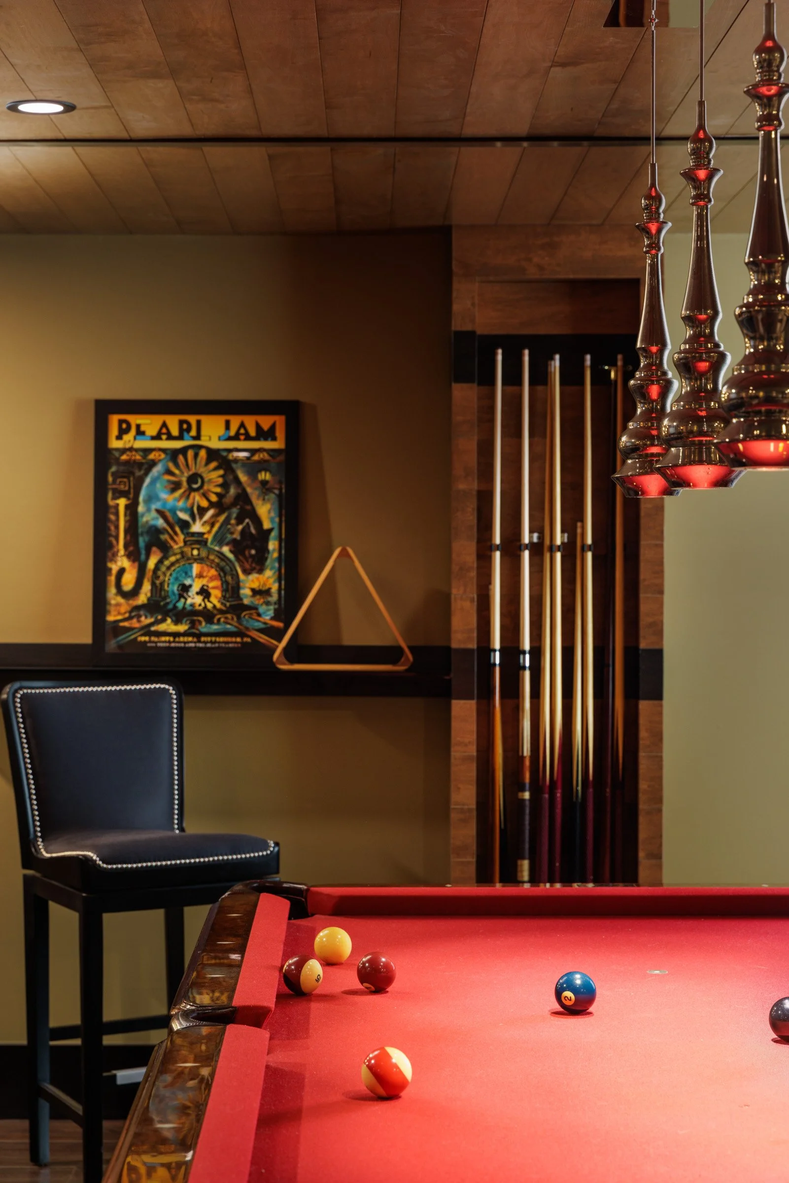Billiard area adjoining the home bar