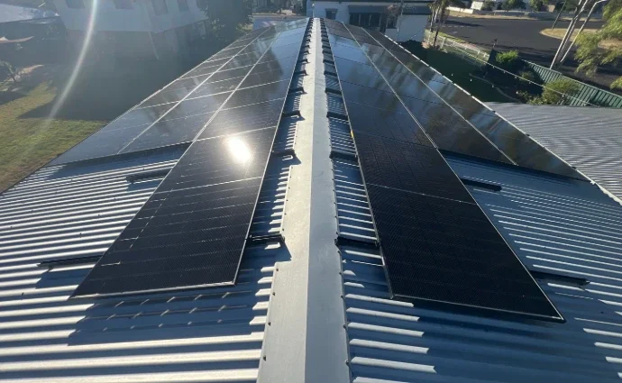 Solar panels installed on a metal roof.
