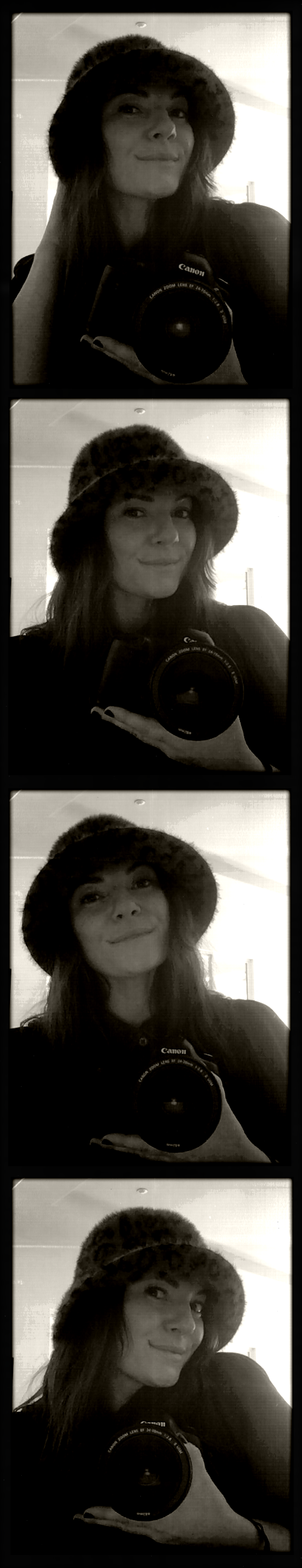 A collage of four black and white photos of Lauren with her Canon camera, wearing a hat, in black and white.