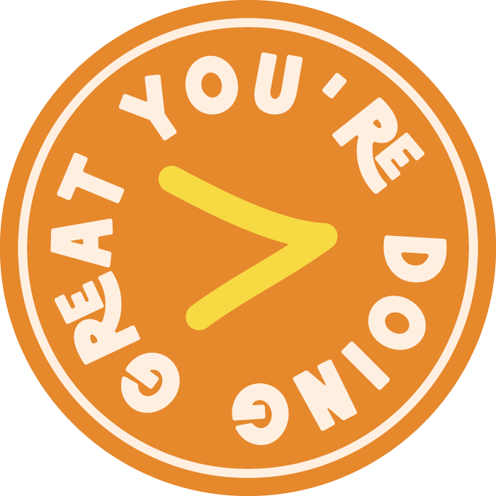 A circular badge with an orange background, white text that reads 'GREAT YOU' READING DOG, and a yellow arrow pointing to the right.