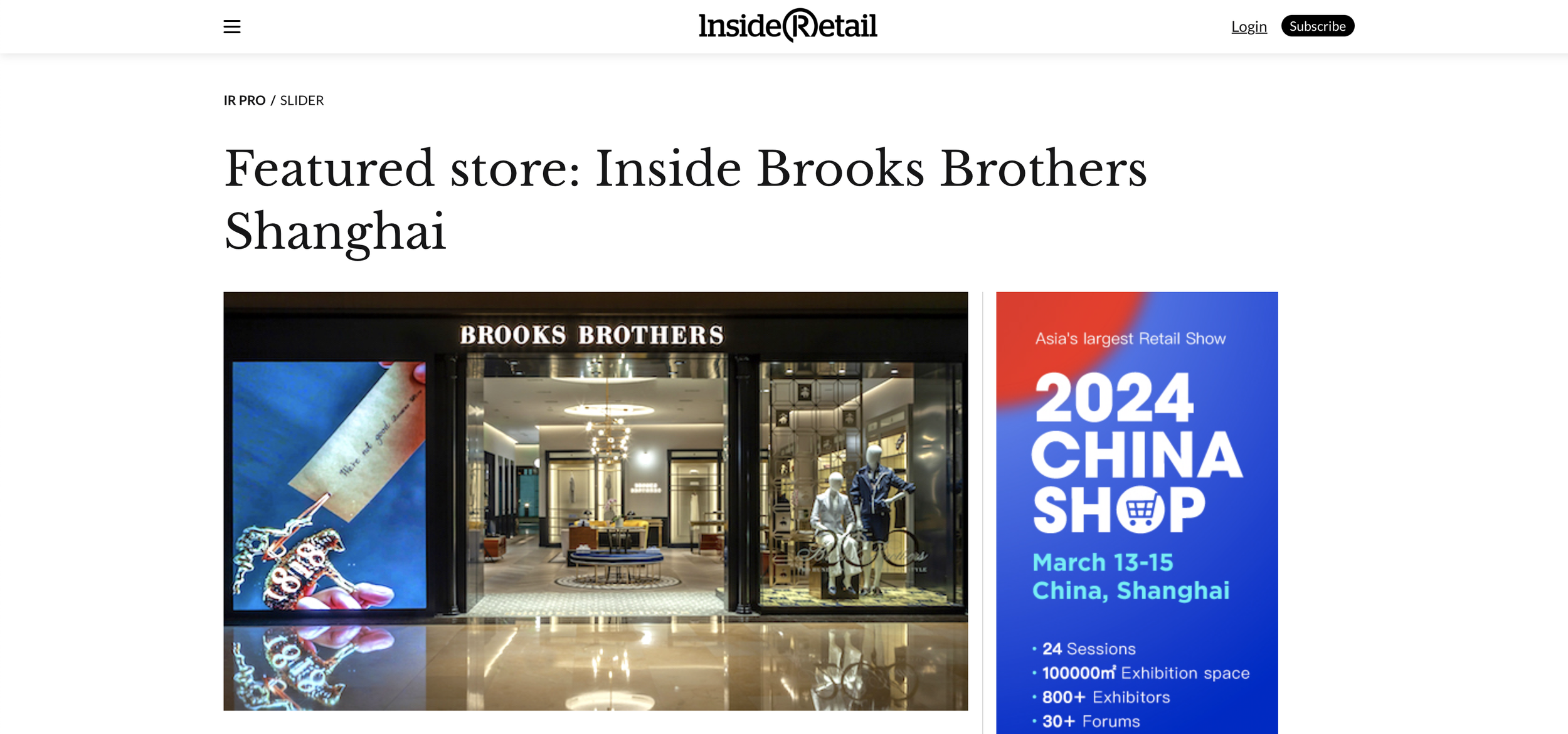 Exterior of Brooks Brothers store with mannequins inside, located in a shopping mall.