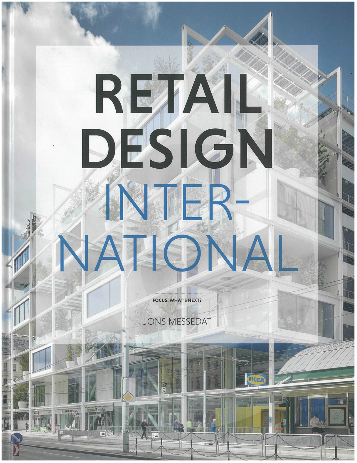 Book cover titled "Retail Design International" with a background image of a modern multi-story retail building with glass storefront, trees, and a blue sky.