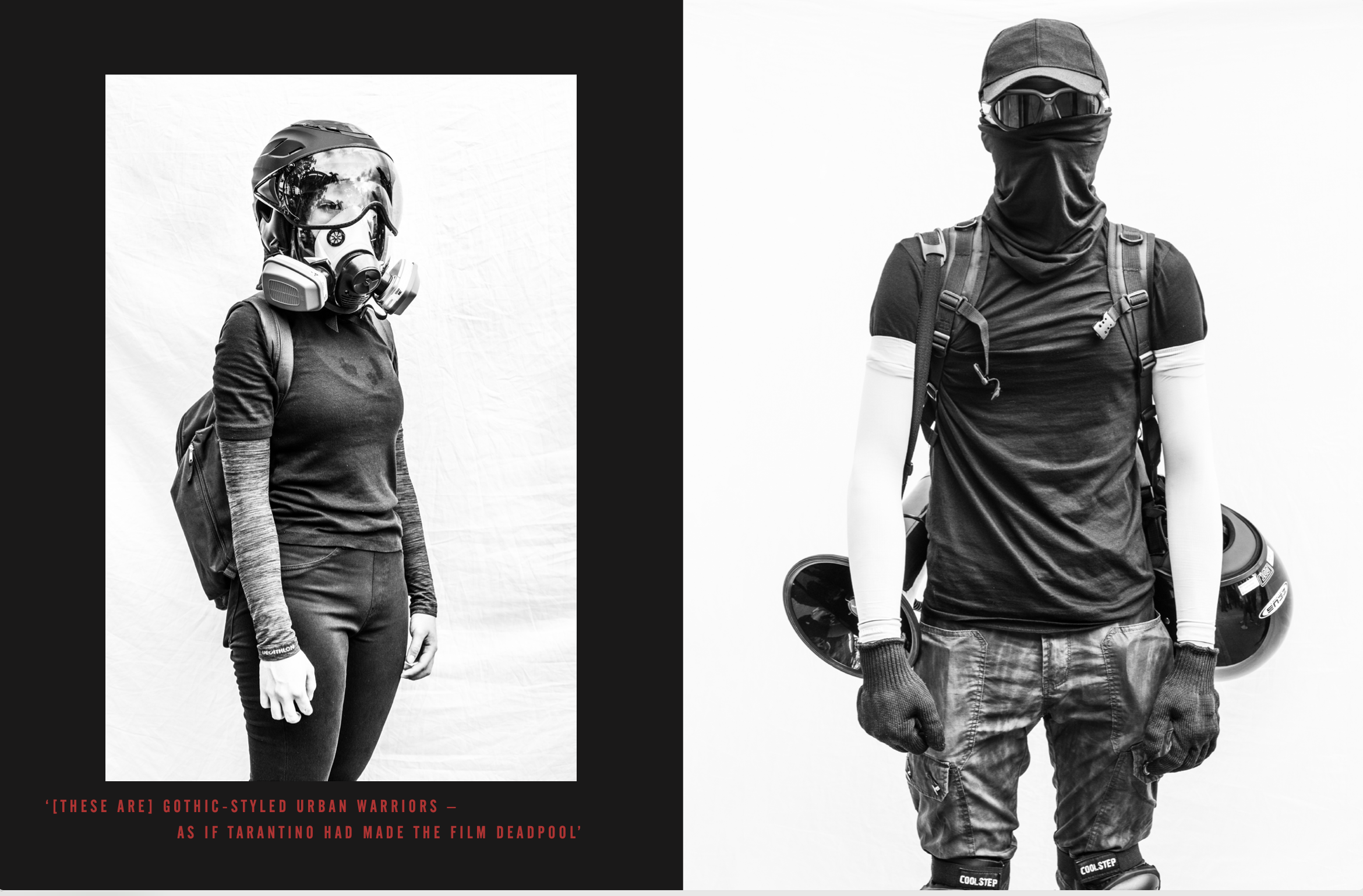 Black and white photo of two individuals wearing urban warrior costumes with helmets, masks, and backpacks. The person on the right has their face covered with a mask and sunglasses, wearing black gloves, cargo pants, and boots. The person on the lef