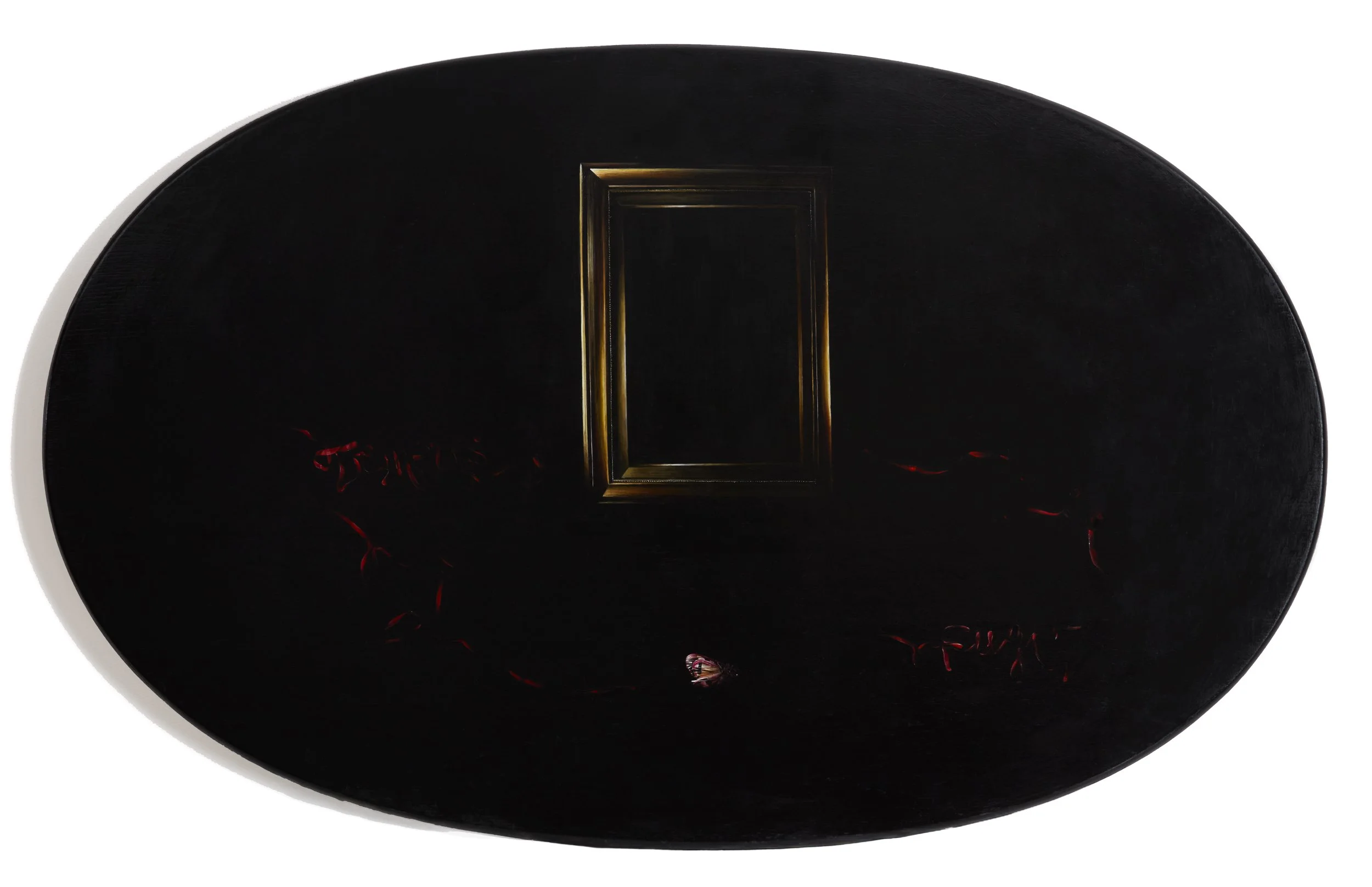 Close-up of a black oval-shaped object with a rectangular golden frame in the centre, and red ribbon and butterfly underneath, against a white background.