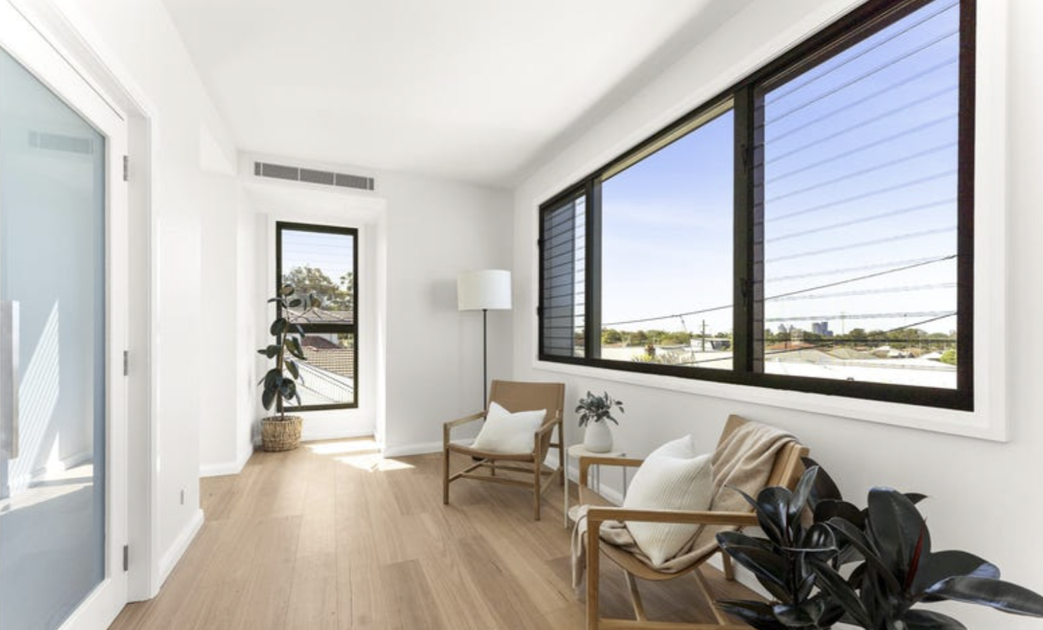 Adamstown townhouse — interior painting and detailed finishes around doors and windows.