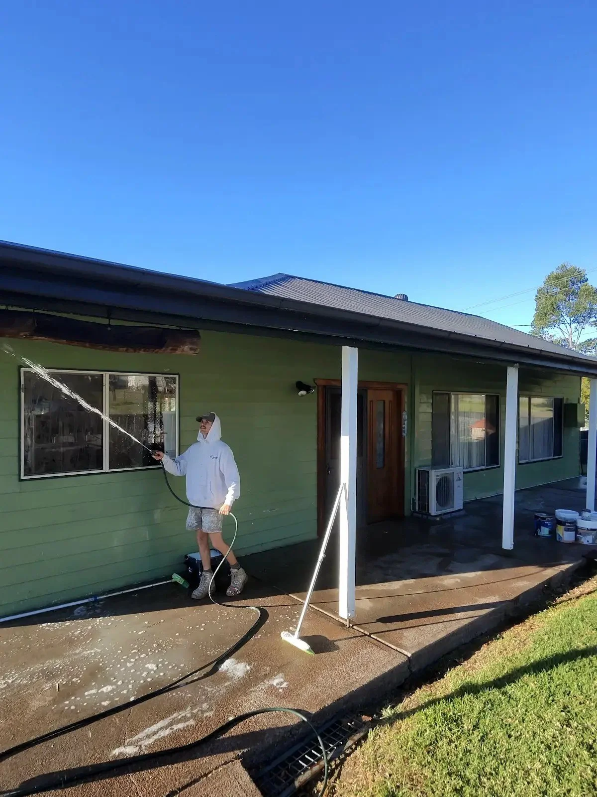 Exterior surface preparation before painting.