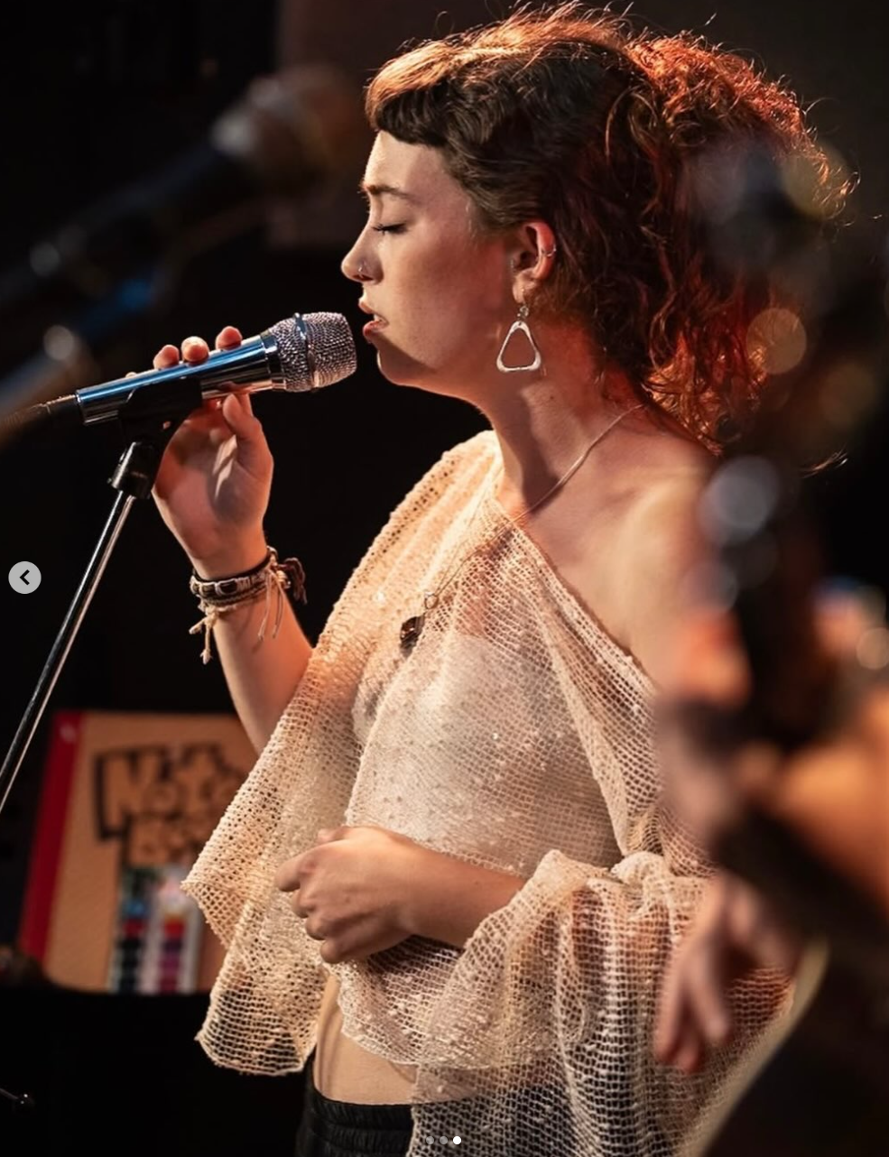 Image of Maddie from Veduna singing on stage