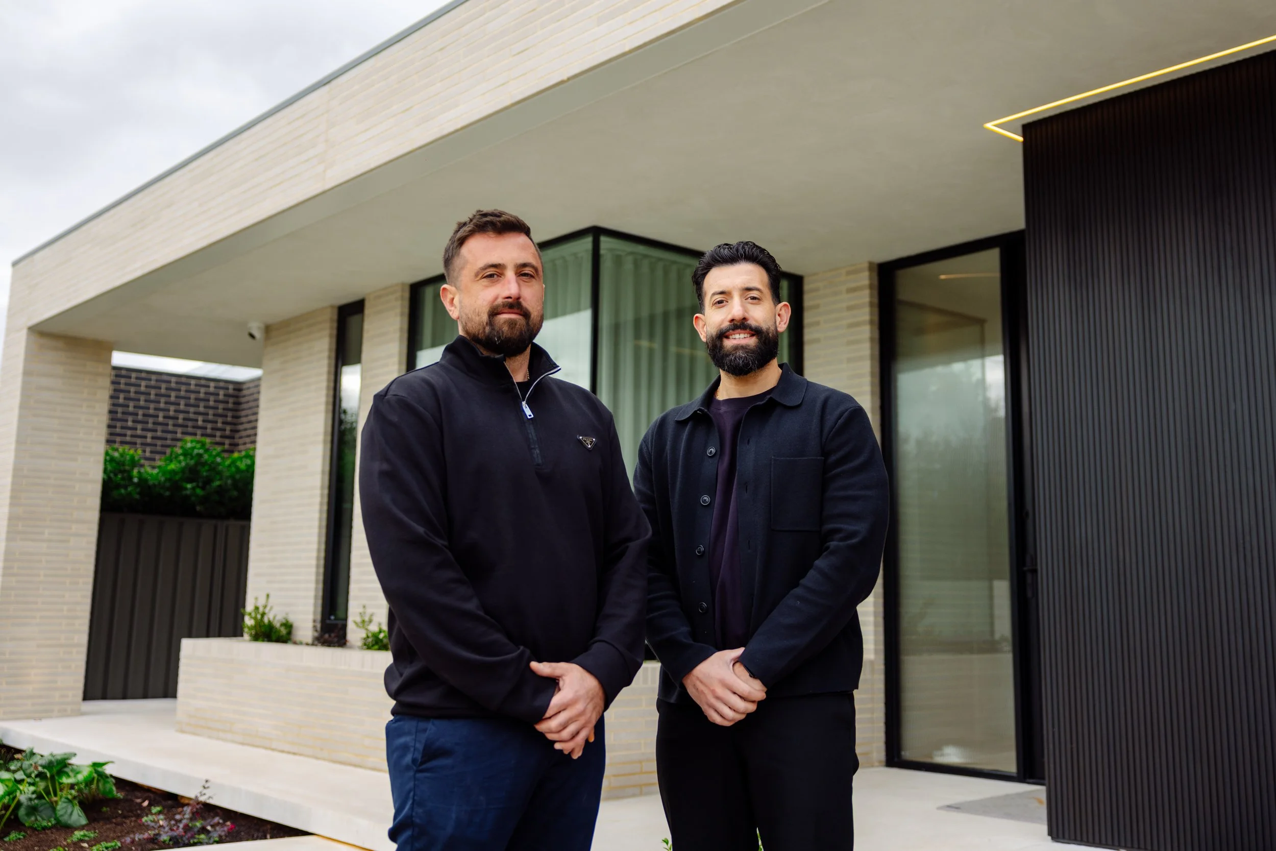 Mastacon founders Paul Marino and Bojan Stegnjaic outside a contemporary Adelaide home