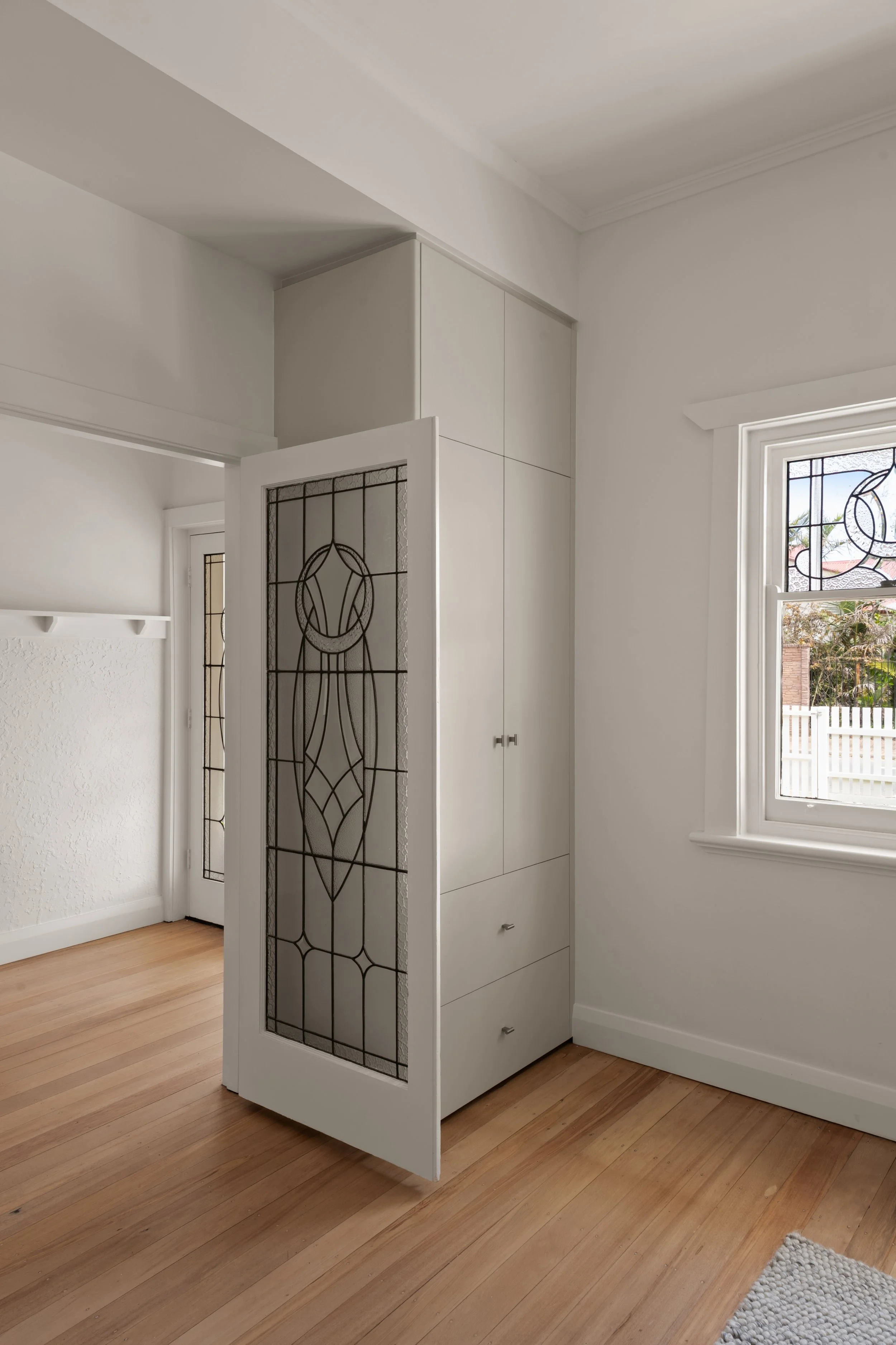 Original leadlight door and white interior walls in Glenelg North