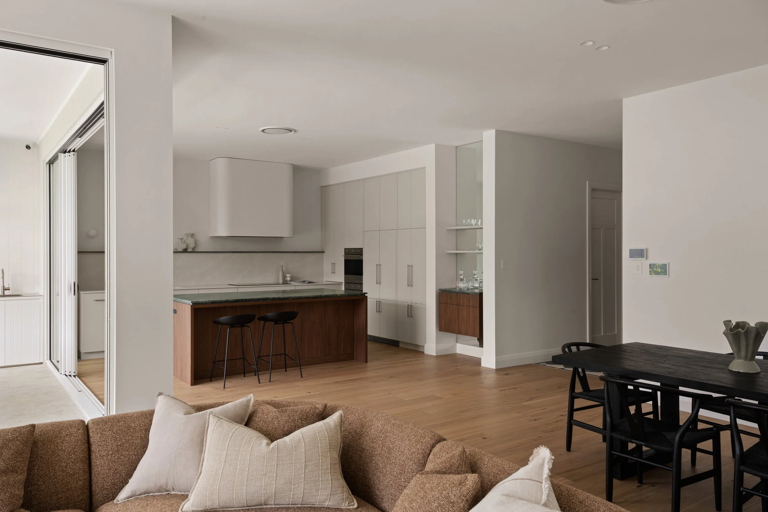 View from the living room towards the timber kitchen island in Glenelg North