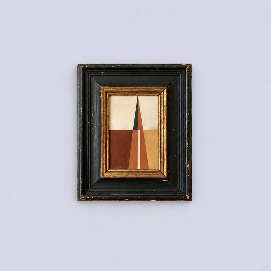 An abstract geometric painting of triangles and rectangles by Studio Earle , framed in a black and gold frame, hung on a light-colored wall.