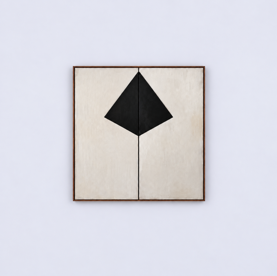 Liaison by Studio Earle. A minimalist, geometric piece of art with a black diamond shape on a  white background, framed in wood, hanging on a plain white wall.