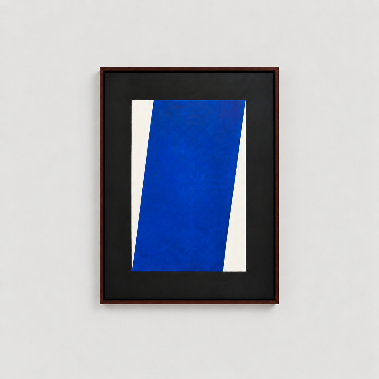 Abstract painting with blue, white, and black geometric shapes in a wooden frame, hung on a white wall.