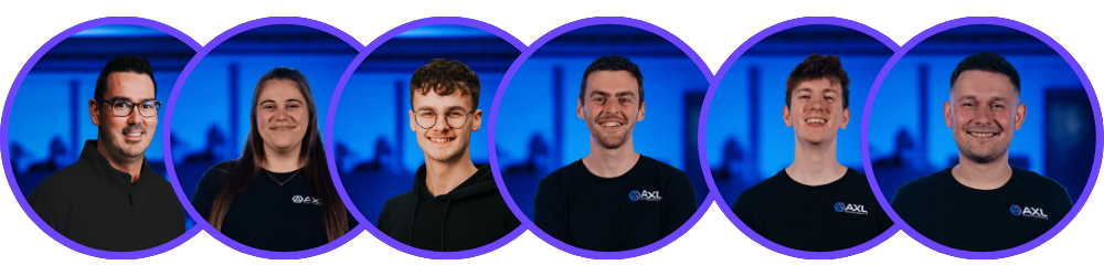 Six people standing against a blue and purple abstract background, all wearing black shirts with a company logo, smiling at the camera.