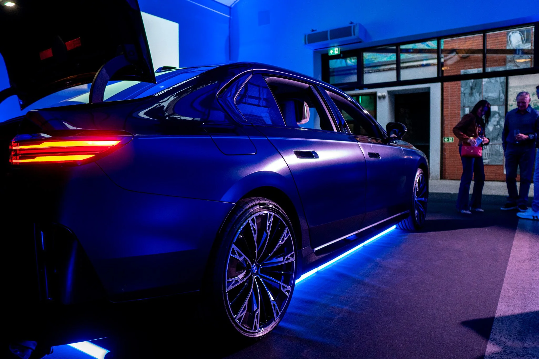Soft-edged LED Fresnel light across the bodywork of a BMW i7 at a Belfast launch event
