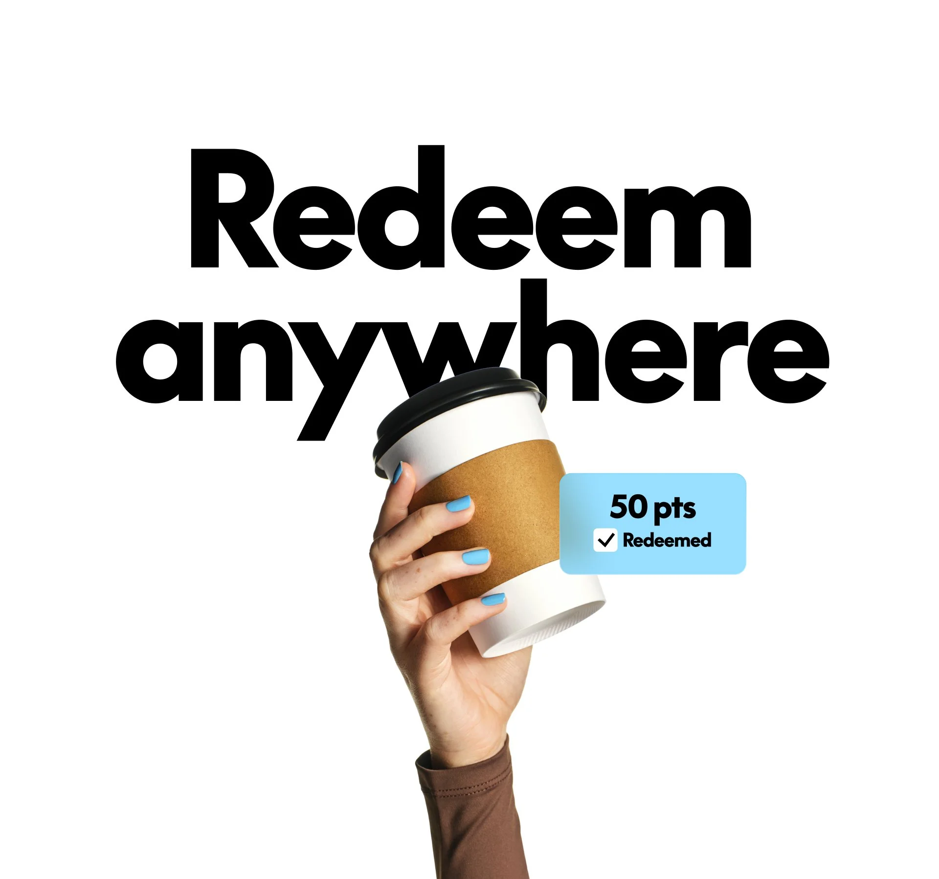 Person holding a takeout coffee cup with a blue reward card displaying 50 points, which is marked as redeemed, in front of a white background with black text saying "Redeem anywhere".
