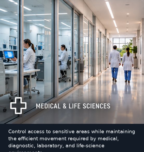 Medical professionals walking through a modern glass-walled clinical and laboratory corridor.