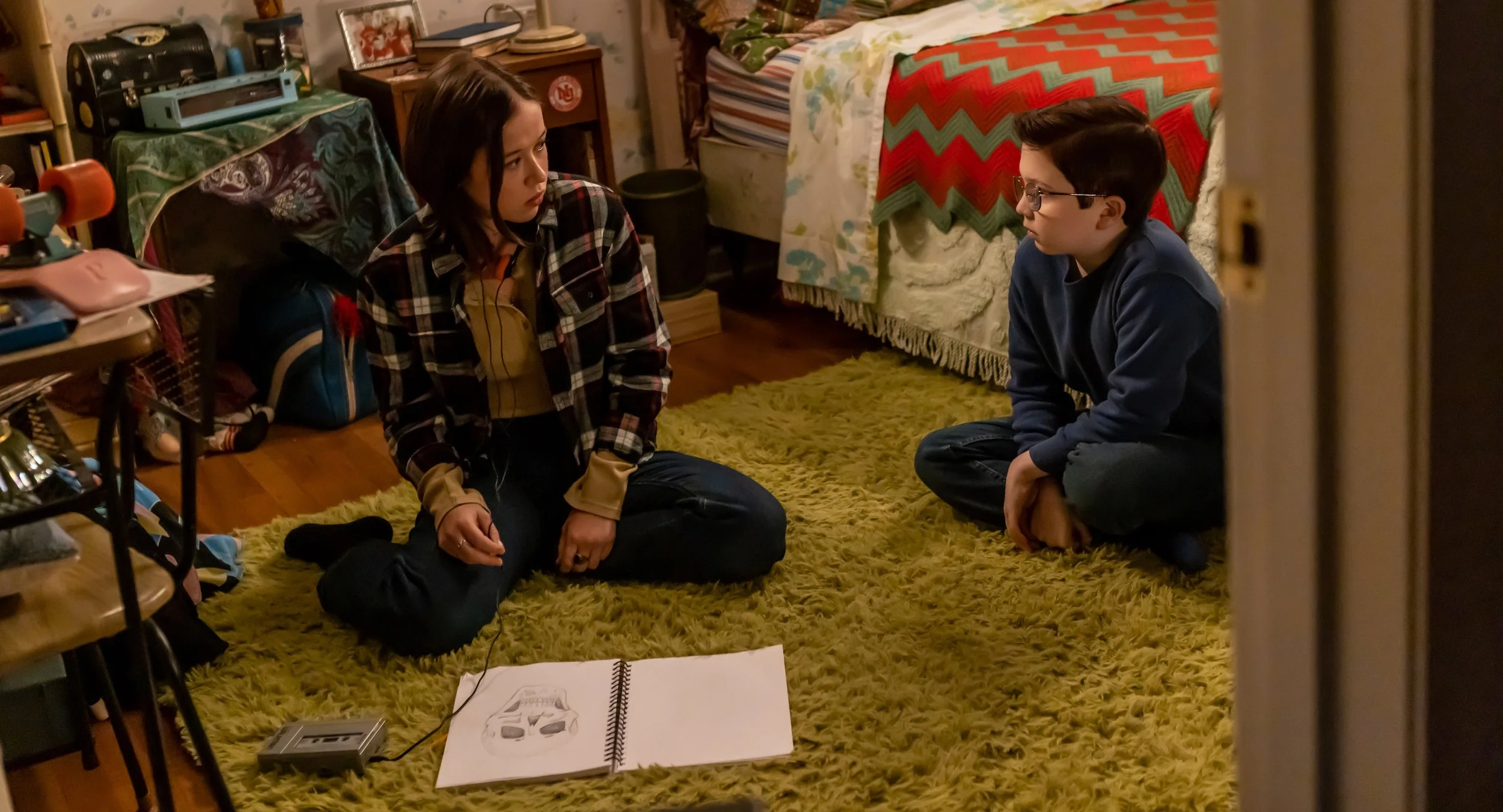 Holly J. Barrett and Matthew Lamb, who play siblings Molly and Jimmy, share a heartfelt conversation in a scene from GOING FOR TWO.
