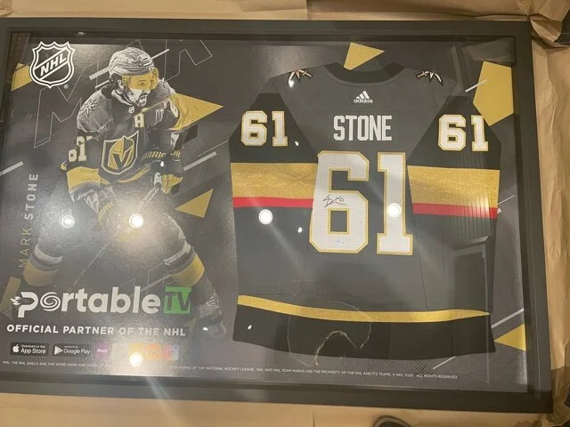 Hockey jersey over photo shadowbox 
