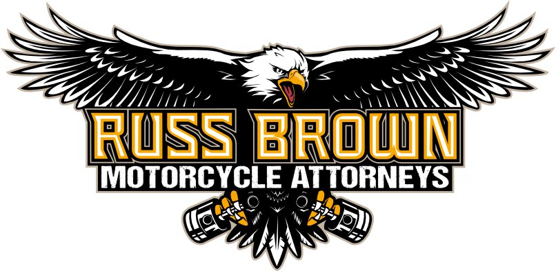 Logo with an eagle and motorcycle parts, featuring the text 'Russ Brown Motorcycle Attorneys'.