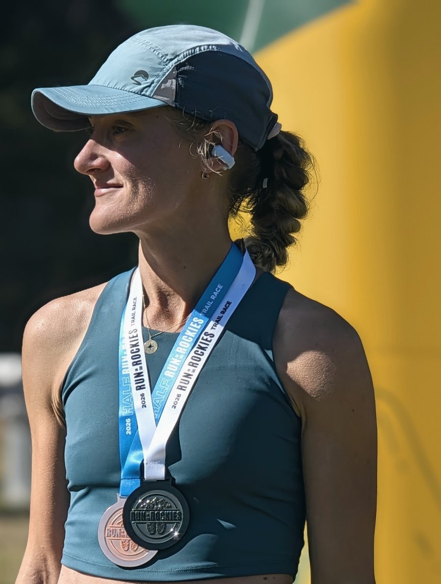 Marina Racetin at a race with her medal