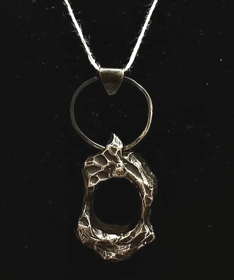 With Ease, cast bronze, cord, 2026