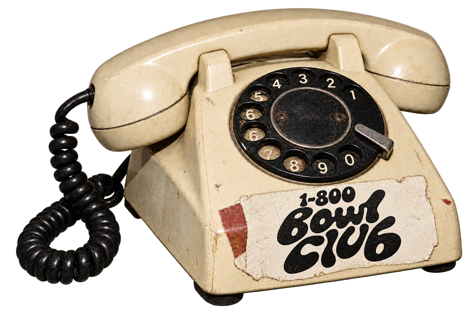 Vintage ivory rotary phone with a label reading 1-800 Bowl Club