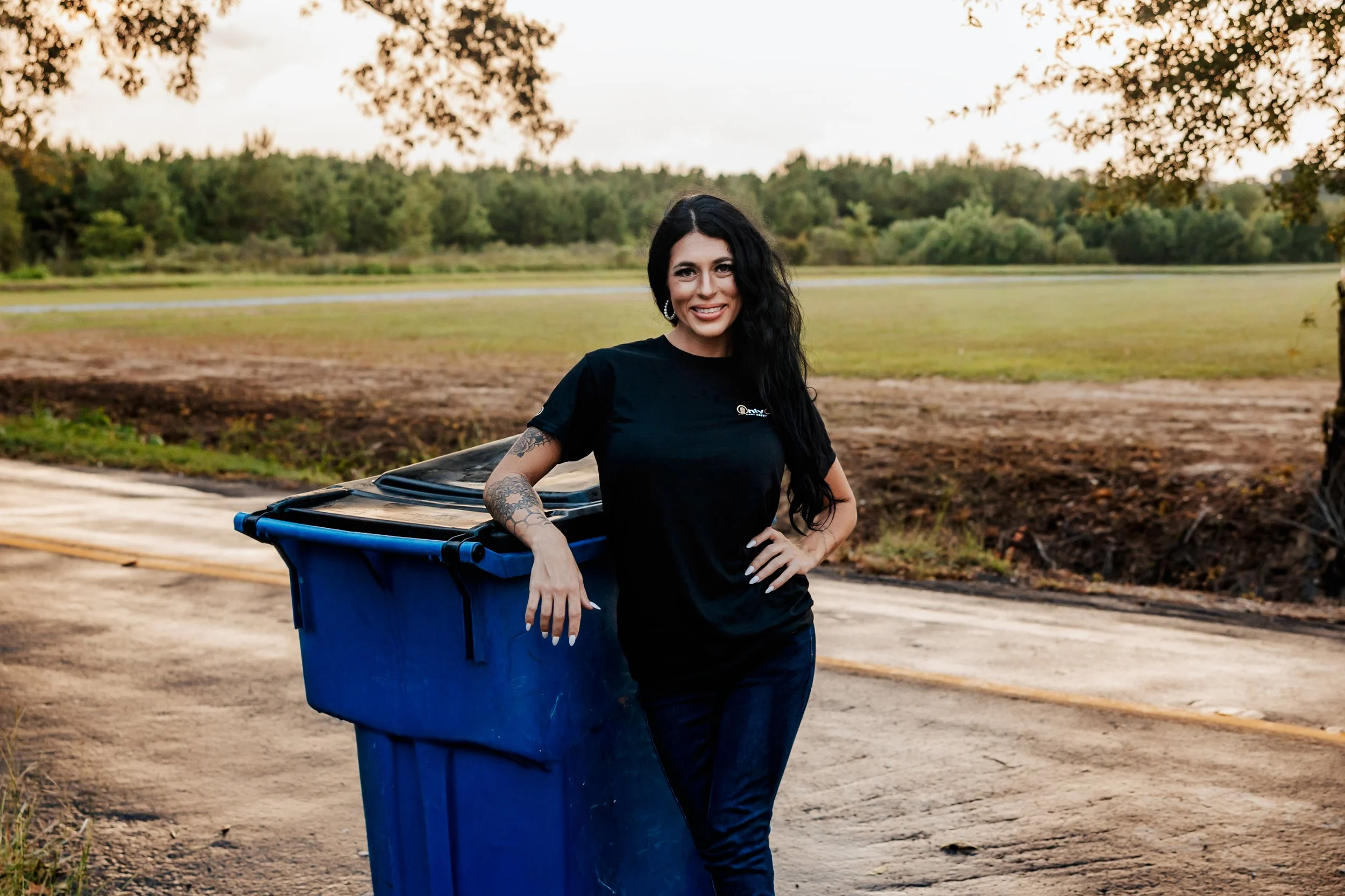 OnlyCans team member with a residential cart