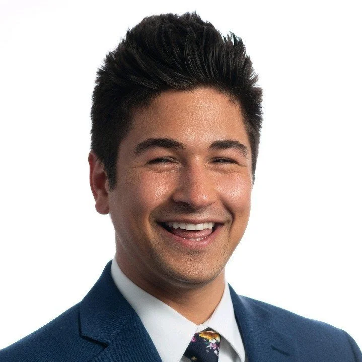 Image is a headshot of Eric Tacl.