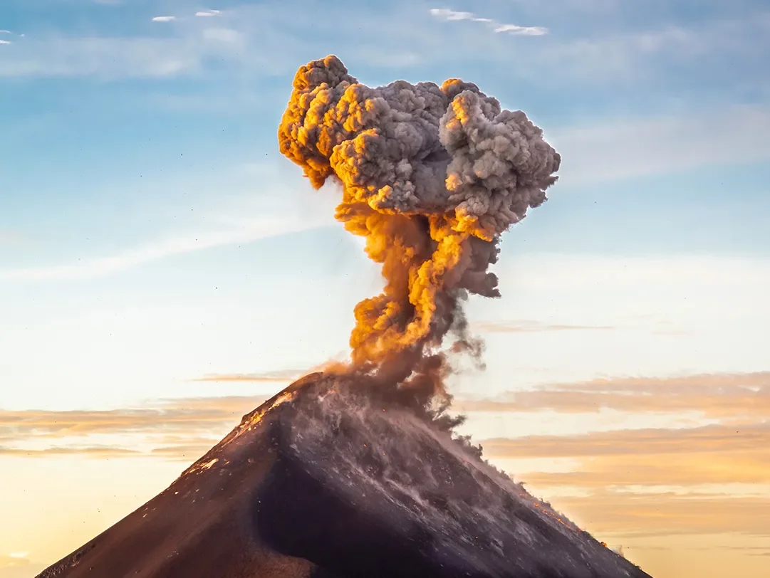 Erupting volcano fuego at sunset on the guatemala photography tour.