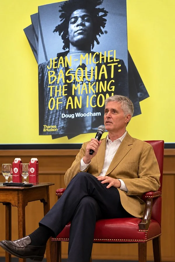 Doug Woodham at a speaking engagement discussing his book 'Jean-Michel Basquiat: The Making of an Icon'