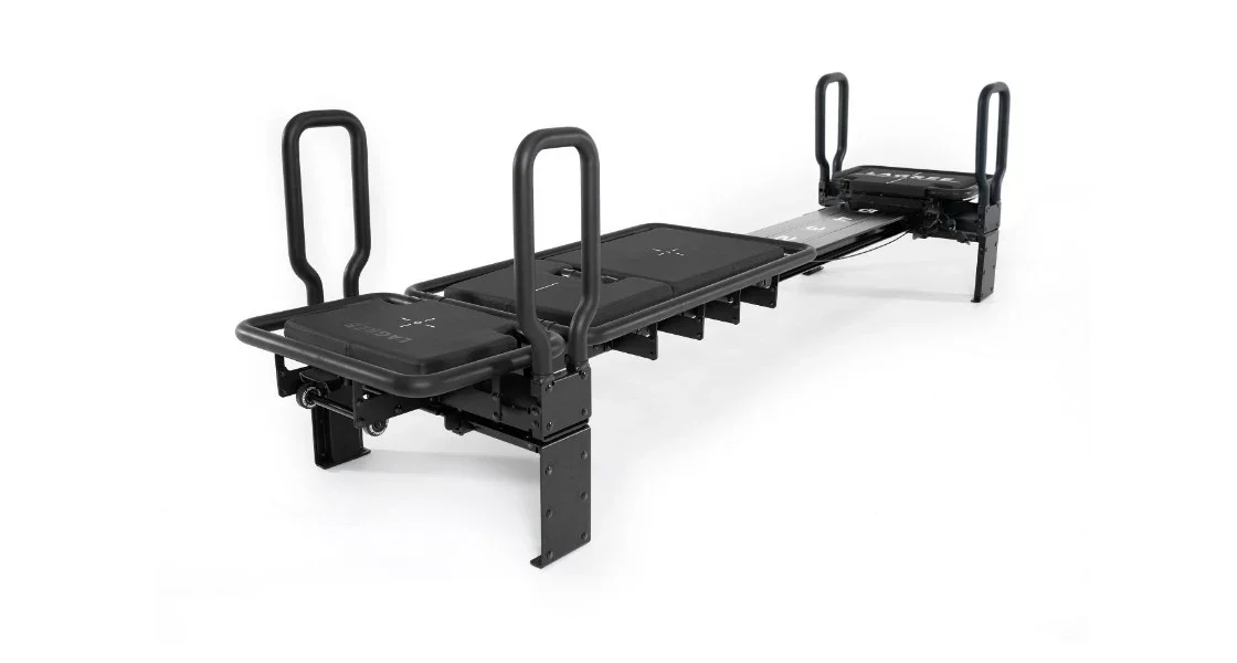 A minipro Lagree megareformer. This machine helps with building strength while protecting joints. This is a high-intensity, low-impact, full body workout.