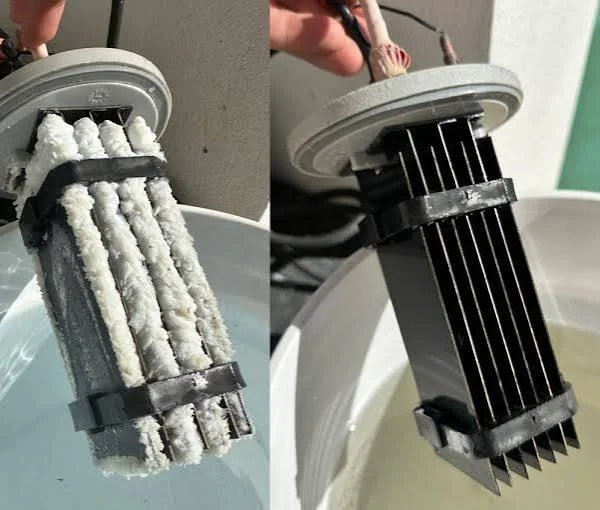 Close-up of a salt cell with dirt and debris buildup on the filter element.