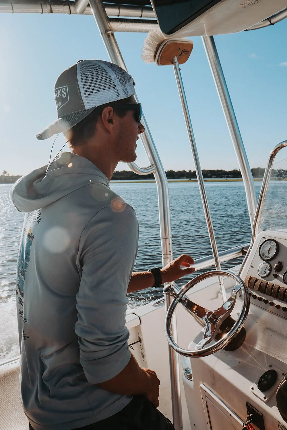 Captain Carson Cook at the helm