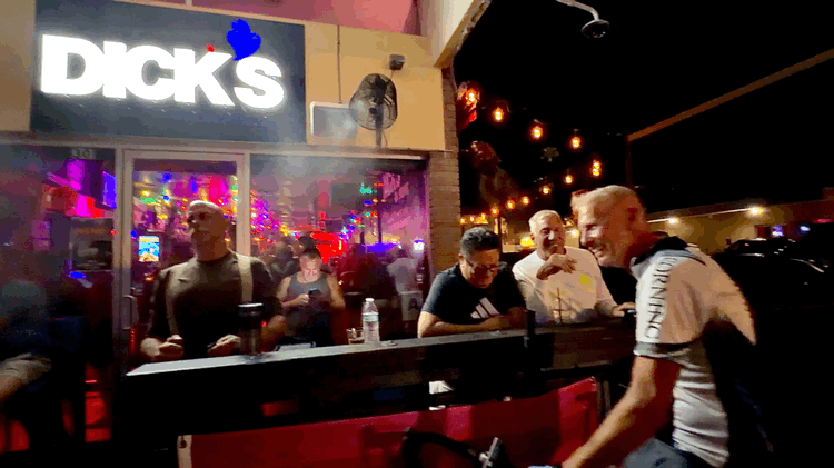 Slow Motion View of Security Staff Posted at Dick's Front Door