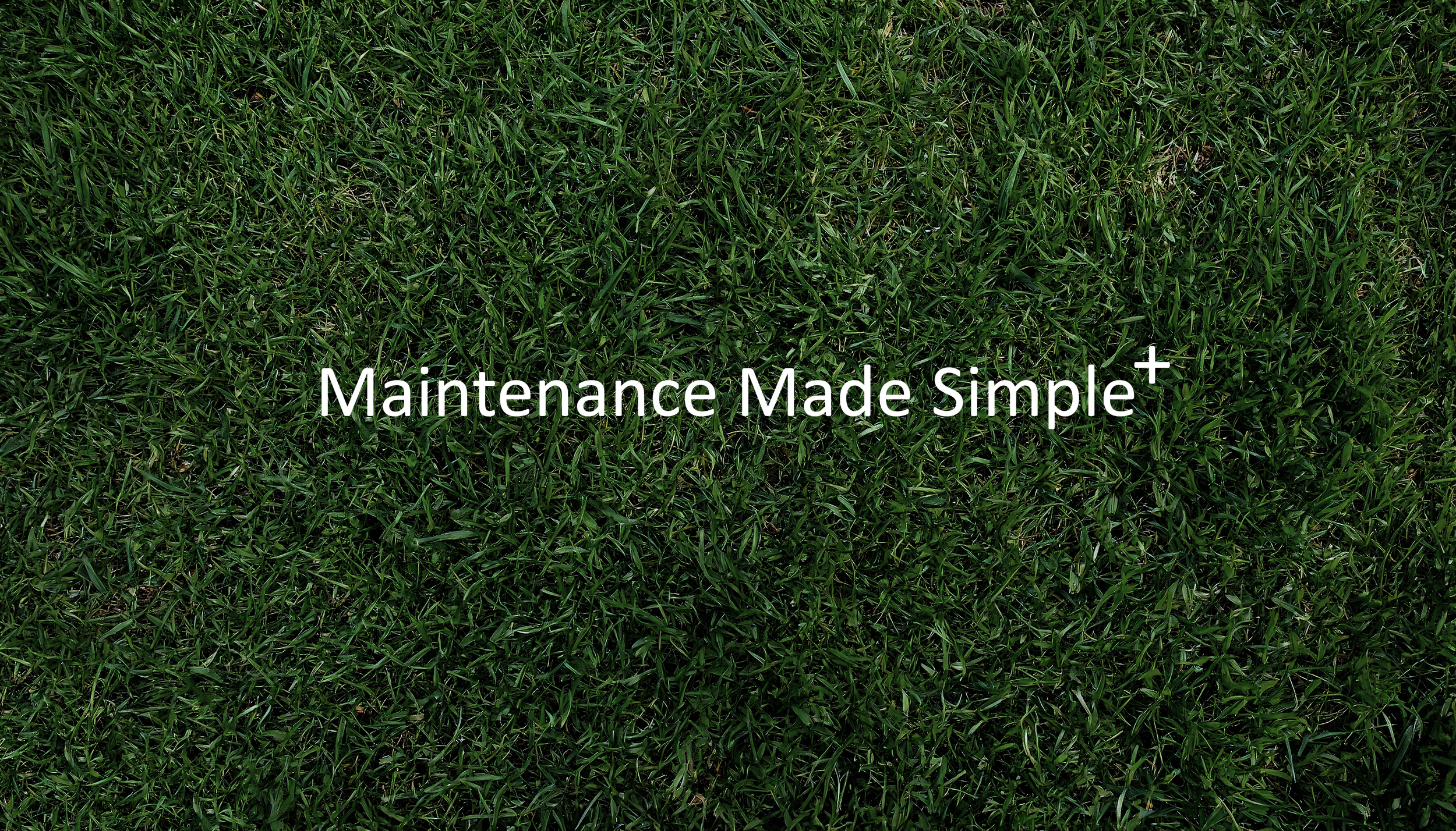 Close-up of green grass with white text overlay that reads "Maintenance Made Simple".