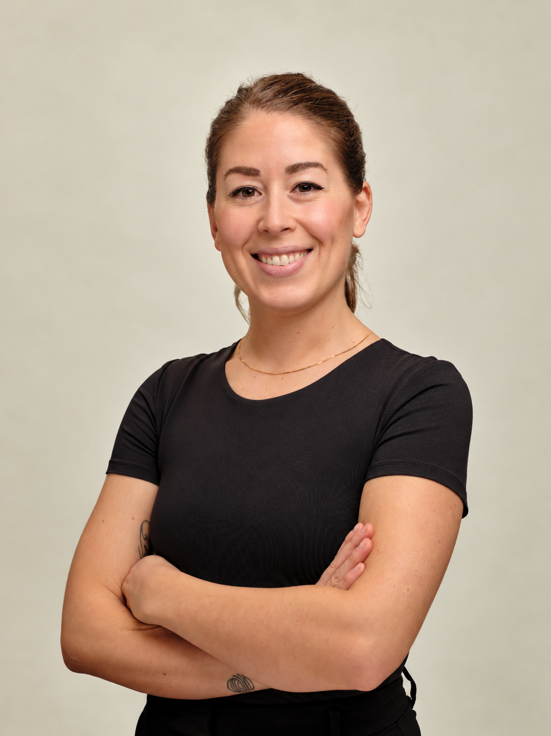 Britney, Registered Psychotherapist (Qualifying), smiling in a portrait